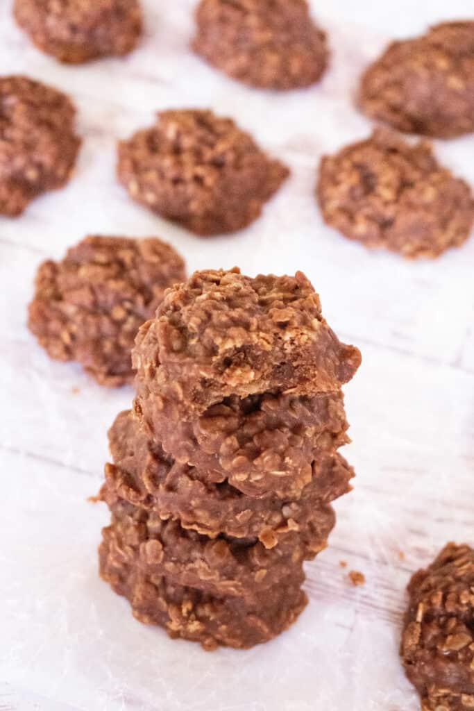 A stack of no bake cookies on wax paper