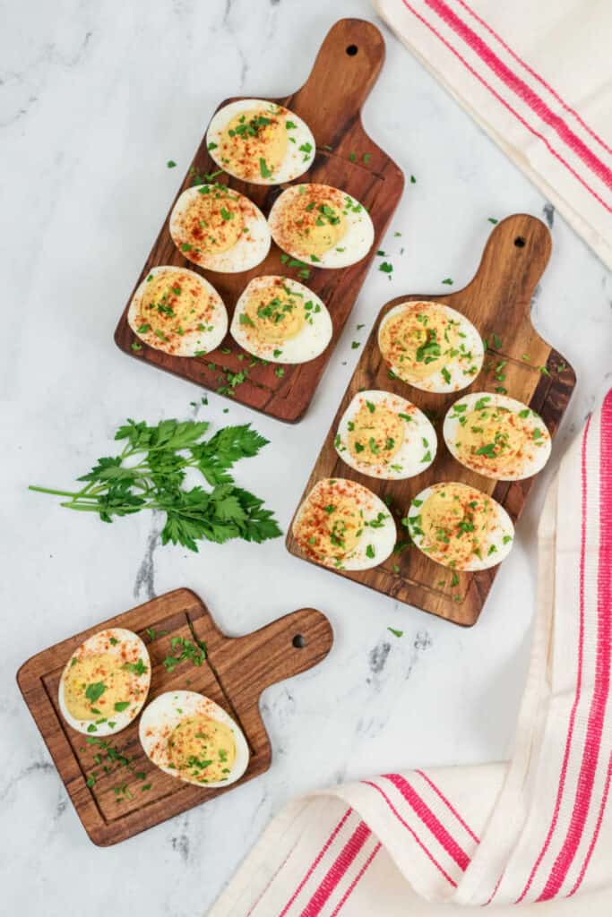 Deviled eggs on wooden boards