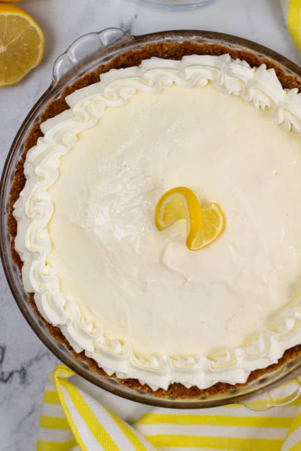 A sugar free lemon pie in a glass pie pan. 