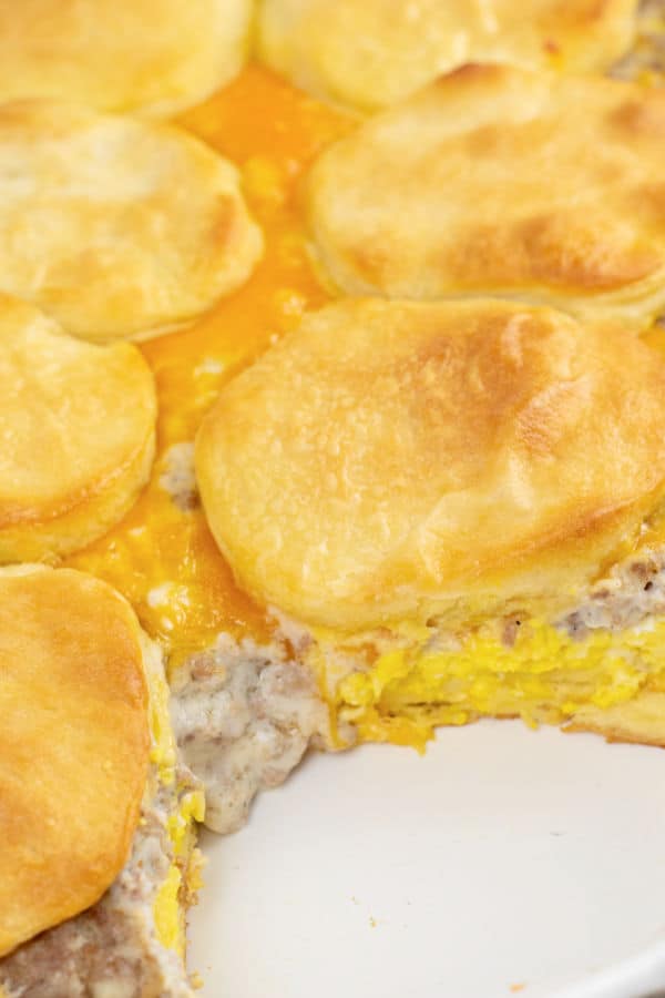 A close up of the inside of sausage biscuits and gravy casserole 