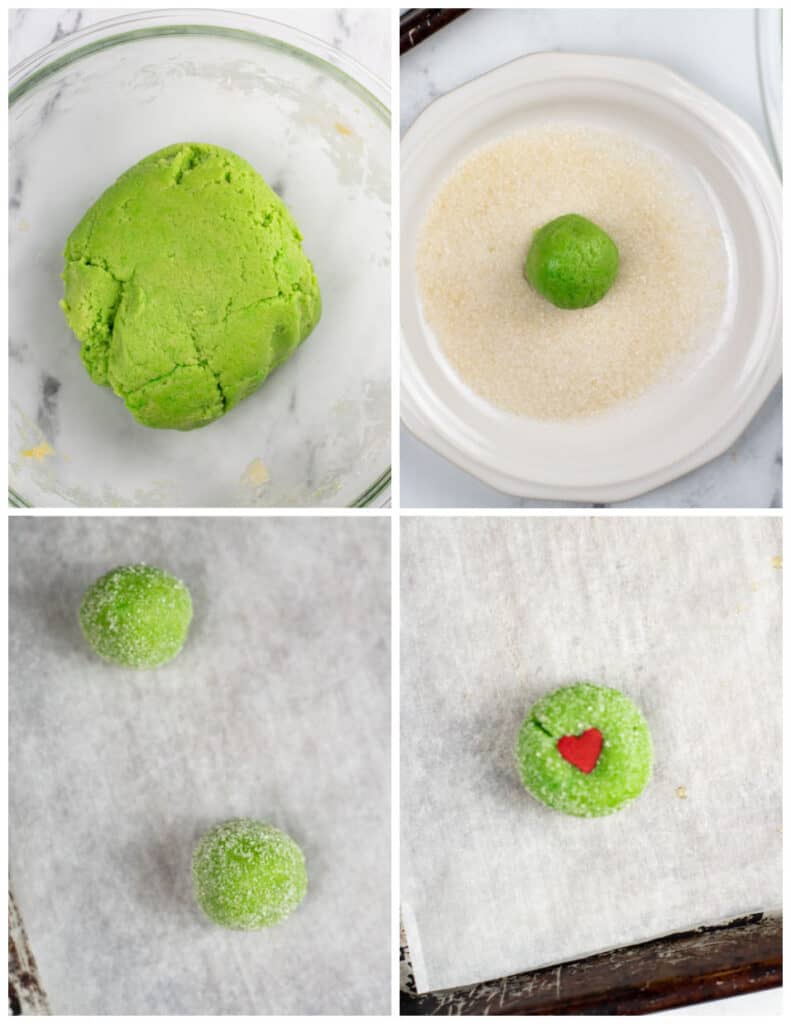 A collage of four pictures showing how to make Grinch crinkle cookies. The first picture is green cookie dough in a glass mixing bowl. In the next picture a ball of the dough is in the center of a plate of granulated sugar. In the next picture the sugar covered dough balls have been placed on parchment lined baking sheet. In the final picture a large heart shaped sprinkle has been placed in the center of the balls of dough. 
