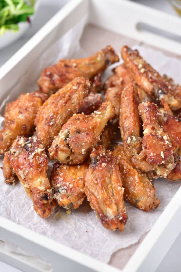 A pile of garlic parmesan chicken wings. 