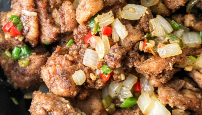 A close-up of a portion of salt and pepper chicken.