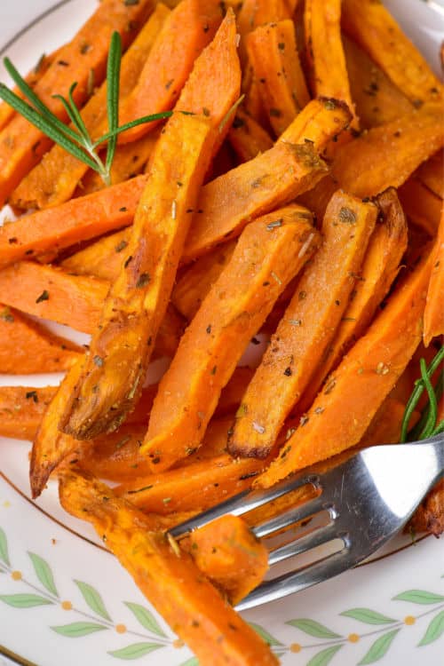 A close-up of a plate of air fryer sweet potato fries.
