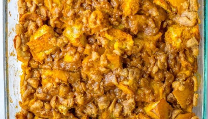 A close up of pumpkin french toast in a glass baking pan