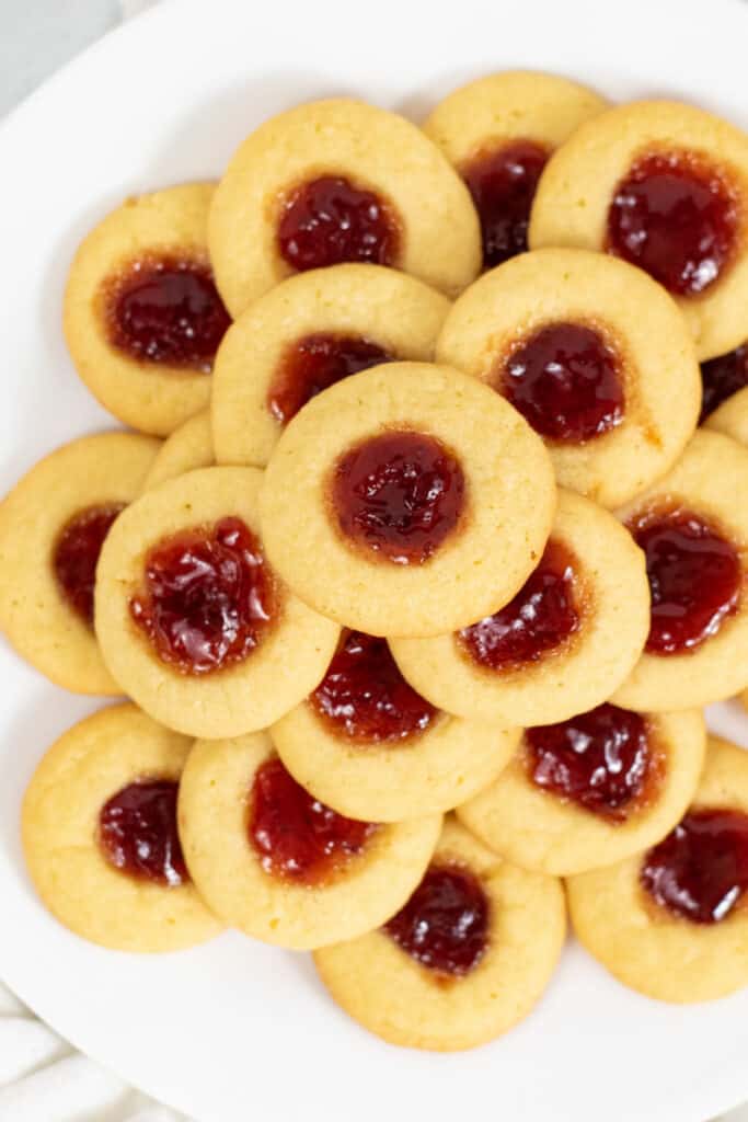 A plate full of thumbprint cookies
